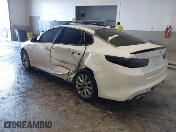 2016 Kia Optima SX Turbo with VIN 5XXGW4L23GG016526, listed as a IAAI auction lot 41428139 with 112,603 mi miles and . Bid and sale history available at carsss.com. Image 3.
