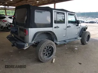 2017 Jeep Wrangler Unlimited Sport with VIN 1C4BJWDG1HL591515, listed as a IAAI auction lot 42426201 with 124,131 mi miles and . Bid and sale history available at DreamBid. Image 4.