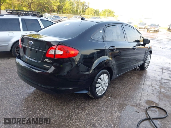 2012 Ford Fiesta S with VIN 3FADP4AJ0CM100103, listed as a IAAI auction lot 41854642 with 144,661 mi miles. Bid and sale history available at carsss.com. Image 4.