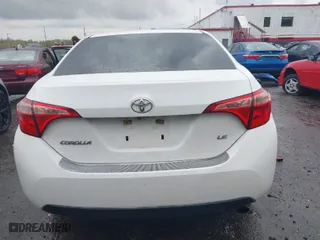 2019 Toyota Corolla L with VIN 5YFBURHE6KP937090, listed as a IAAI auction lot 42041637 with 129,138 mi miles. Bid and sale history available at carsss.com. Image 16.