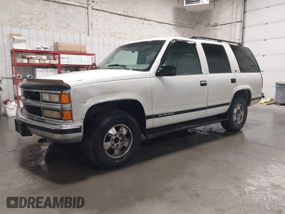 1999 Chevrolet Tahoe Z71 z VIN 1GNEK13R0XJ364222, wystawiony jako IAAI lot #41988710 z przebiegiem 204 577 mil mil oraz . Historia ofert i sprzedaży dostępna na DreamBid. Obrazek 2.