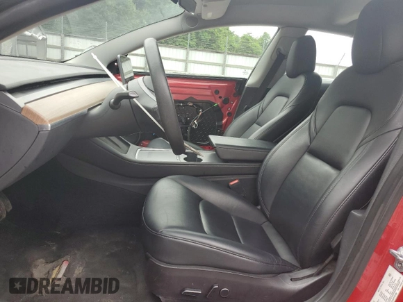 2023 Tesla Model 3 with VIN 5YJ3E1EA6PF437390, listed as a Copart auction lot 62825135 with 115,121 mi miles and Clean title. Bid and sale history available at DreamBid. Image 7.
