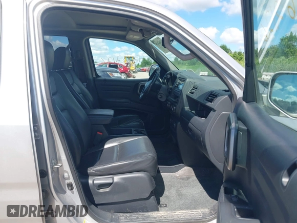 2013 Honda Ridgeline RTL with VIN 5FPYK1F51DB007236, listed as a IAAI auction lot 42762126 with 201,758 mi miles and . Bid and sale history available at DreamBid. Image 5.