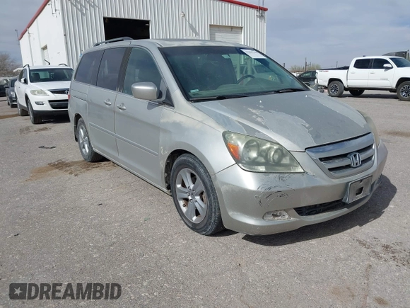 2005 Honda Odyssey TOURING with VIN 5FNRL38895B060605, listed as a IAAI auction lot 41809330 with 228,487 mi miles. Bid and sale history available at carsss.com. Image 1.