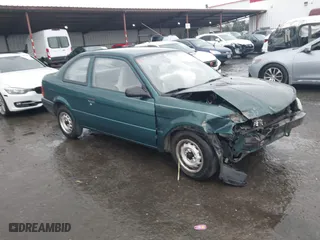 1996 Toyota Tercel DX with VIN JT2AC52L9T0127262, listed as a IAAI auction lot 41504210 with 135,732 mi miles. Bid and sale history available at carsss.com. Image 1.