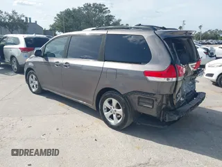 2014 Toyota Sienna LE AAS with VIN 5TDKK3DCXES432611, listed as a IAAI auction lot 40771635 with 214,145 mi miles and . Bid and sale history available at carsss.com. Image 3.