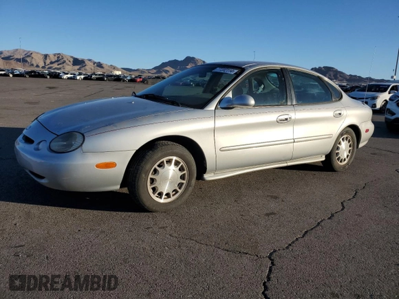 1996 Ford Taurus LX with VIN 1FALP53S9TG173438, listed as a Copart auction lot 77232114 with 89,789 mi miles and Clean title. Bid and sale history available at DreamBid. Image 1.