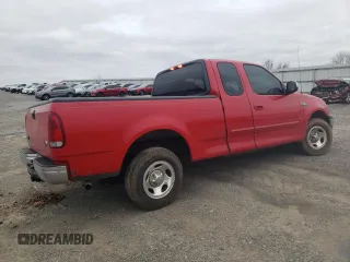 2002 Ford F-150 XL with VIN 1FTRX17W12NB06157, listed as a Copart auction lot 51209485 with 167,953 mi miles and Salvage Title. Bid and sale history available at carsss.com. Image 3.