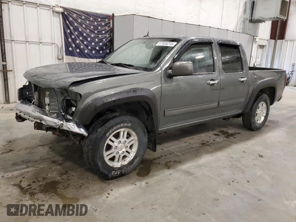 2010 GMC Canyon SLE1 with VIN 1GTJTCDE5A8148716, listed as a Copart auction lot 57559215 with 126,523 mi miles and Salvage title. Bid and sale history available at DreamBid. Image 1.