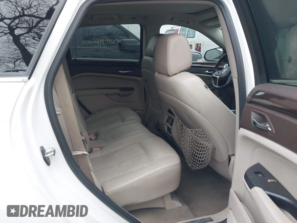 2013 Cadillac SRX Luxury Collection with VIN 3GYFNCE32DS527577, listed as a IAAI auction lot 41916467 with 137,462 mi miles and . Bid and sale history available at DreamBid. Image 8.