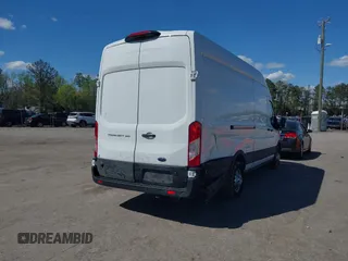 2022 Ford Transit Cargo with VIN 1FTBW3X80NKA69156, listed as a IAAI auction lot 42059236 with 100,096 mi miles and . Bid and sale history available at DreamBid. Image 4.
