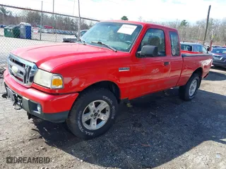 2006 Ford Ranger XLT with VIN 1FTZR45E16PA94852, listed as a IAAI auction lot 42013319 with 122,978 mi miles. Bid and sale history available at carsss.com. Image 2.