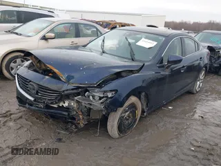 2016 Mazda Mazda6 i Touring with VIN JM1GJ1T54G1434497, listed as a IAAI auction lot 41654012 with 133,901 mi miles. Bid and sale history available at carsss.com. Image 2.