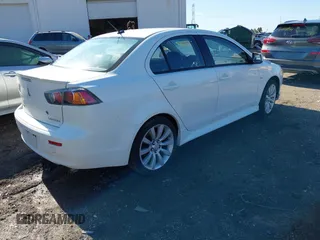 2011 Mitsubishi Lancer GTS with VIN JA32U8FW3BU030708, listed as a IAAI auction lot 41826170 with 213,889 mi miles. Bid and sale history available at carsss.com. Image 4.