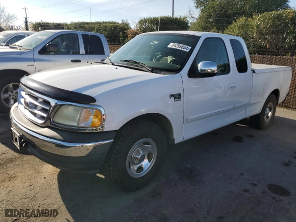 2003 Ford F-150 Work Series with VIN 2FTRX17WX3CA63767, listed as a Copart auction lot 84299684 with 165,719 mi miles and Salvage Title. Bid and sale history available at carsss.com. Image 1.