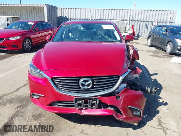 2016 Mazda 6 i Grand Touring с VIN JM1GJ1W50G1430328, выставлен на аукционе IAAI как лот 41879262 с пробегом 122 545 миль миль и . История ставок и продаж доступна на DreamBid. Изображение 13.