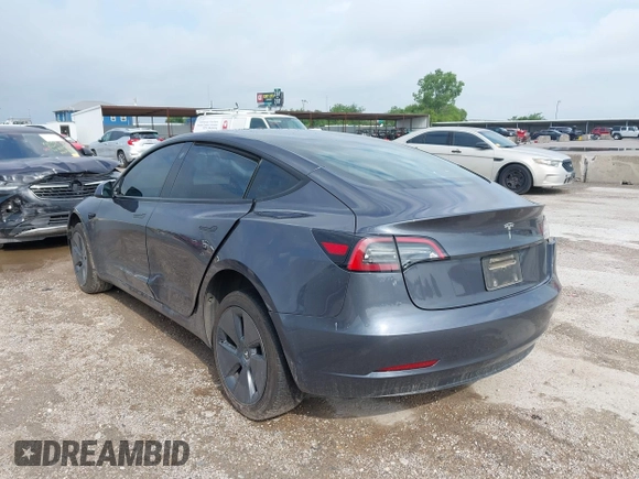 2023 Tesla Model 3 with VIN 5YJ3E1EA5PF676316, listed as a IAAI auction lot 42384765 with 33,715 mi miles and . Bid and sale history available at DreamBid. Image 3.