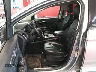 2022 Ford Edge Titanium z VIN 2FMPK4K98NBA82041, wystawiony jako IAAI lot #42422875 z przebiegiem 93 654 mil mil oraz . Historia ofert i sprzedaży dostępna na DreamBid. Obrazek 1.