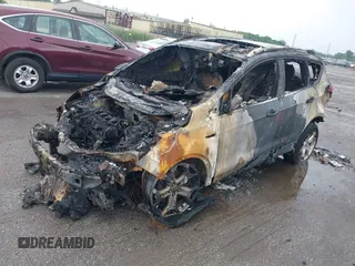 2019 Ford Escape Titanium z VIN 1FMCU9J95KUB24713, wystawiony jako IAAI lot #42554610 z przebiegiem Nie podano mil oraz . Historia ofert i sprzedaży dostępna na DreamBid. Obrazek 2.