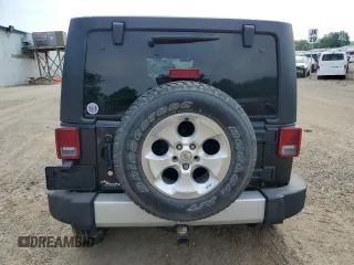 2013 Jeep Wrangler Unlimited Sahara with VIN 1C4BJWEG8DL678692, listed as a Copart auction lot 62289785 with 132,528 mi miles and Clean title. Bid and sale history available at DreamBid. Image 6.