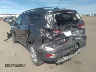 2013 Ford Escape SEL with VIN 1FMCU9H9XDUB32041, listed as a IAAI auction lot 36310371 with 99,560 mi miles. Bid and sale history available at carsss.com. Image 3.