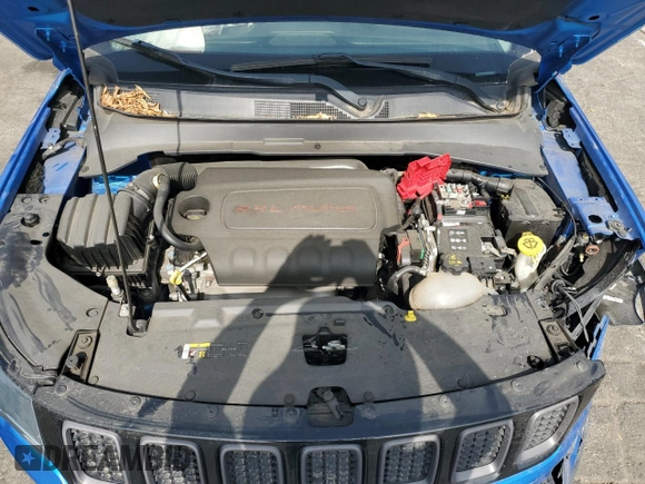 2021 Jeep Compass Trailhawk z VIN 3C4NJDDB9MT556516, wystawiony jako Copart lot #60338575 z przebiegiem 86 978 mil mil oraz Czysty tytuł • Clean title. Historia ofert i sprzedaży dostępna na DreamBid. Obrazek 12.