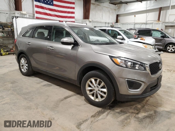 2018 Kia Sorento LX with VIN 5XYPG4A5XJG374879, listed as a Copart auction lot 53319395 with 121,443 mi miles and Clean Title. Bid and sale history available at DreamBid. Image 4.