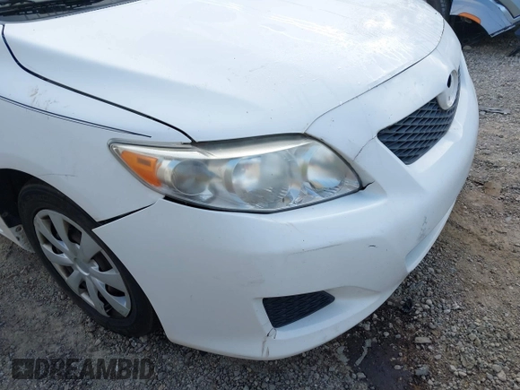 2010 Toyota Corolla with VIN 2T1BU4EE1AC312151, listed as a IAAI auction lot 42761709 with 121,356 mi miles and . Bid and sale history available at DreamBid. Image 14.