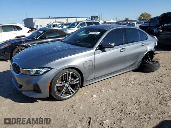 2023 BMW 3 Series 330e xDrive with VIN 3MW39FS07P8D00974, listed as a Copart auction lot 84912304 with 18,879 mi miles and Salvage Title. Bid and sale history available at carsss.com. Image 1.