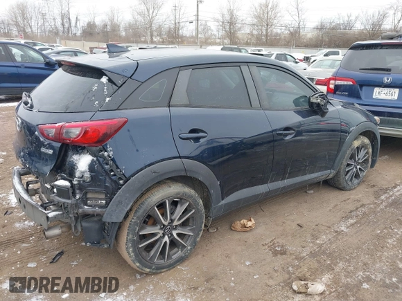 2017 Mazda CX-3 Touring z VIN JM1DKFC75H0173127, wystawiony jako IAAI lot #41614605 z przebiegiem 101 963 mil mil oraz . Historia ofert i sprzedaży dostępna na DreamBid. Obrazek 4.