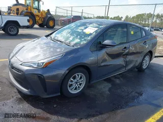 2021 Toyota Prius L Eco with VIN JTDKAMFU4M3134778, listed as a IAAI auction lot 41843429 with 145,757 mi miles. Bid and sale history available at carsss.com. Image 20.