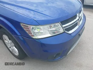 2012 Dodge Journey SXT with VIN 3C4PDCBB0CT323362, listed as a IAAI auction lot 42528338 with 187,995 mi miles and . Bid and sale history available at DreamBid. Image 13.