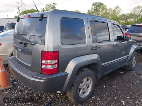 2012 Jeep Liberty Sport with VIN 1C4PJMAK1CW198611, listed as a IAAI auction lot 42187221 with 118,623 mi miles. Bid and sale history available at carsss.com. Image 4.