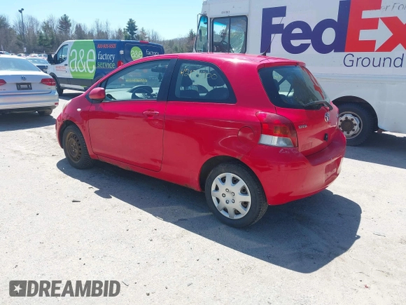 2009 Toyota Yaris with VIN JTDJT903X95251943, listed as a IAAI auction lot 42124300 with 193,503 mi miles. Bid and sale history available at carsss.com. Image 3.