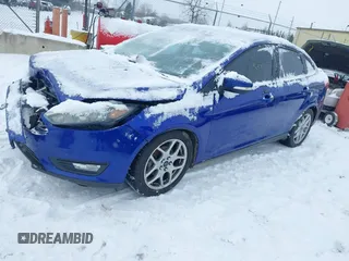 2015 Ford Focus SE with VIN 1FADP3F23FL361274, listed as a IAAI auction lot 41292796 with 102,741 mi miles. Bid and sale history available at carsss.com. Image 2.