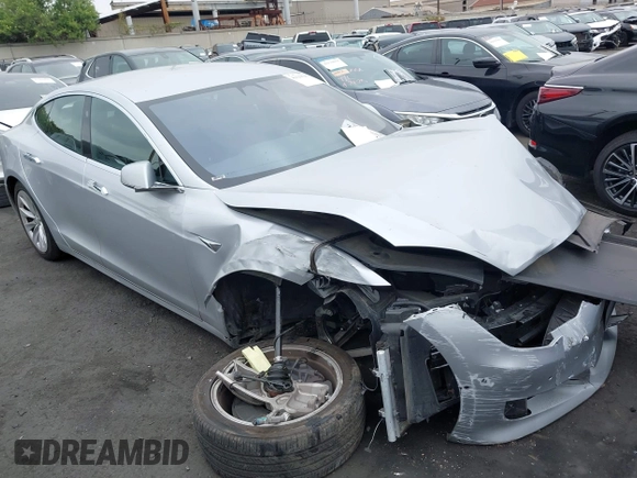 2017 Tesla Model S 100D with VIN 5YJSA1E24HF193563, listed as a IAAI auction lot 42120120 with 60,391 mi miles and . Bid and sale history available at DreamBid. Image 1.