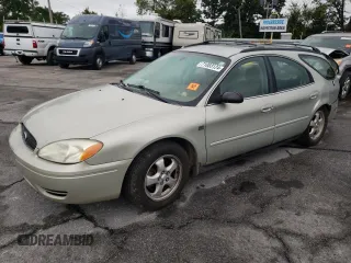 2004 Ford Taurus SE with VIN 1FAFP58S74A190863, listed as a Copart auction lot 71083124 with 187,193 mi miles and Salvage title. Bid and sale history available at DreamBid. Image 1.