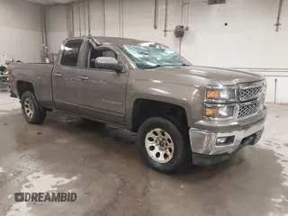 2015 Chevrolet Silverado 1500 LT with VIN 1GCVKREC6FZ183559, listed as a IAAI auction lot 41813921 with 171,304 mi miles and . Bid and sale history available at DreamBid. Image 1.