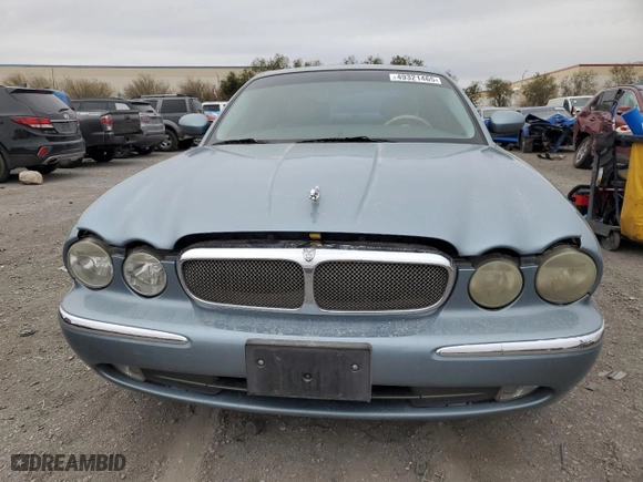 2005 Jaguar XJ with VIN SAJWA79CX5SG35319, listed as a Copart auction lot 49321465 with 182,834 mi miles and Salvage Title. Bid and sale history available at carsss.com. Image 5.