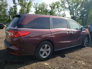 2018 Honda Odyssey EX with VIN 5FNRL6H55JB037386, listed as a Copart auction lot 63577475 with 125,498 mi miles and Salvage title. Bid and sale history available at DreamBid. Image 3.