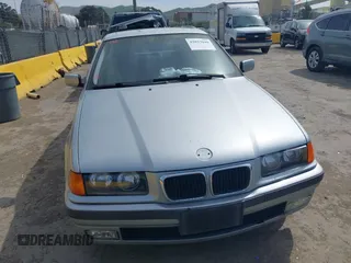1997 BMW 3 Series 318iA with VIN WBACC0322VEK25478, listed as a IAAI auction lot 42033040 with 212,320 mi miles. Bid and sale history available at carsss.com. Image 12.
