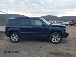 2013 Jeep Patriot Sport with VIN 1C4NJRBB5DD237216, listed as a IAAI auction lot 41628024 with 49,571 mi miles and . Bid and sale history available at carsss.com. Image 14.