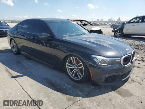 2017 BMW 7 Series 740i xDrive with VIN WBA7E4C53HGU99133, listed as a Copart auction lot 73007174 with 84,542 mi miles and Non Repairable. Bid and sale history available at carsss.com. Image 4.
