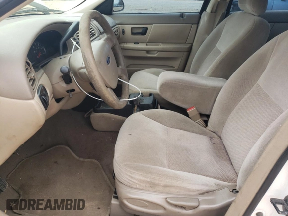 2004 Ford Taurus z VIN 1FAFP52214A194125, wystawiony jako Copart lot #43234295 z przebiegiem 216 877 mil mil oraz Szkody całkowita. Historia ofert i sprzedaży dostępna na DreamBid. Obrazek 7.