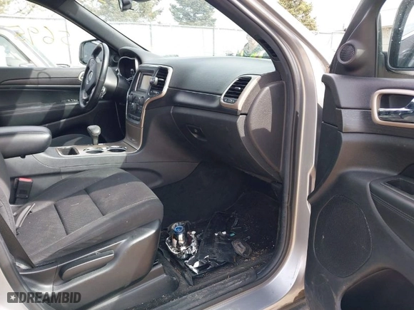 2014 Jeep Grand Cherokee Laredo with VIN 1C4RJFAG7EC243121, listed as a IAAI auction lot 41925695 with 147,999 mi miles. Bid and sale history available at carsss.com. Image 5.