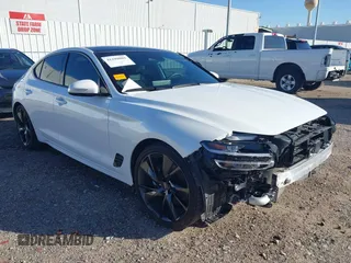 2023 Genesis G70 2.0T with VIN KMTG34TA1PU130245, listed as a IAAI auction lot 41198085 with 21,483 mi miles. Bid and sale history available at carsss.com. Image 1.