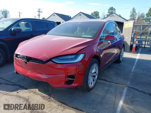 2020 Tesla Model X Long Range with VIN 5YJXCDE22LF217014, listed as a IAAI auction lot 41845824 with 149,375 mi miles and . Bid and sale history available at DreamBid. Image 20.