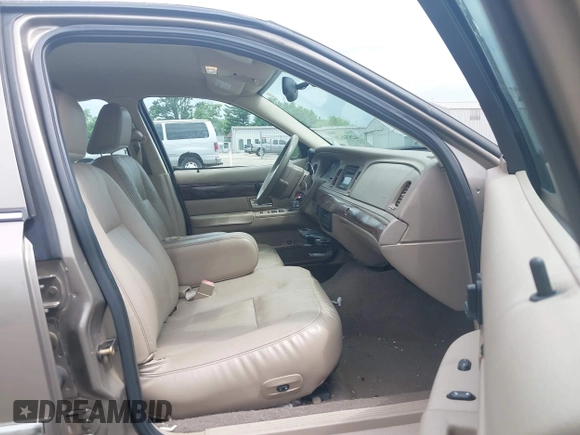 2005 Mercury Grand Marquis LS Premium z VIN 2MEFM75W25X661590, wystawiony jako IAAI lot #42534626 z przebiegiem 113 450 mil mil oraz . Historia ofert i sprzedaży dostępna na DreamBid. Obrazek 5.