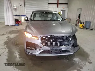 2021 Jaguar F-Pace S z VIN SADCJ2EX5MA670739, wystawiony jako Copart lot #47641555 z przebiegiem 62 165 mil mil oraz Szkoda całkowita • Salvage title. Historia ofert i sprzedaży dostępna na DreamBid. Obrazek 13.