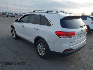 2017 Kia Sorento LX with VIN 5XYPG4A35HG205801, listed as a IAAI auction lot 42143064 with 129,647 mi miles. Bid and sale history available at carsss.com. Image 3.